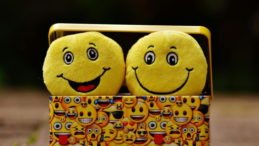 two yellow emoji on yellow case